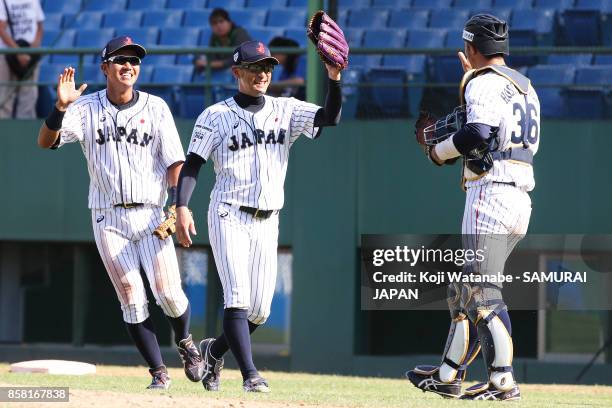 Pitcher Katsutoshi Satake of Japan celebrate their 3-0 victory during the 28th Asian Baseball Championship Super Round match between Japan and South...