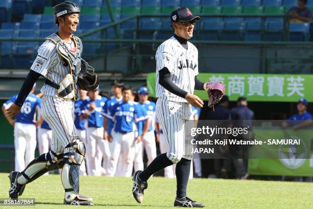 Pitcher Katsutoshi Satake of Japan celebrate their 3-0 victory during the 28th Asian Baseball Championship Super Round match between Japan and South...