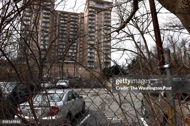 An apartment building soars over a parking lot, believed to have been built over an African American cemetery, in Bethesda, Maryland on January 27,...