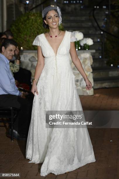 Model walks the Po de Arroz runway show at New York Fashion Week Bridal October 2017 at Hendrick's Tavern on October 5, 2017 in Roslyn, New York.