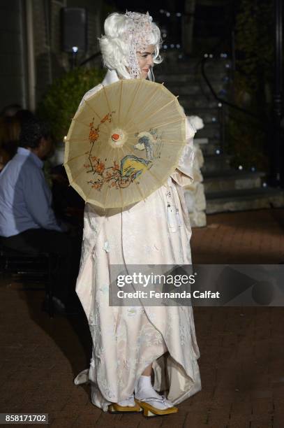 Model walks the Po de Arroz runway show at New York Fashion Week Bridal October 2017 at Hendrick's Tavern on October 5, 2017 in Roslyn, New York.