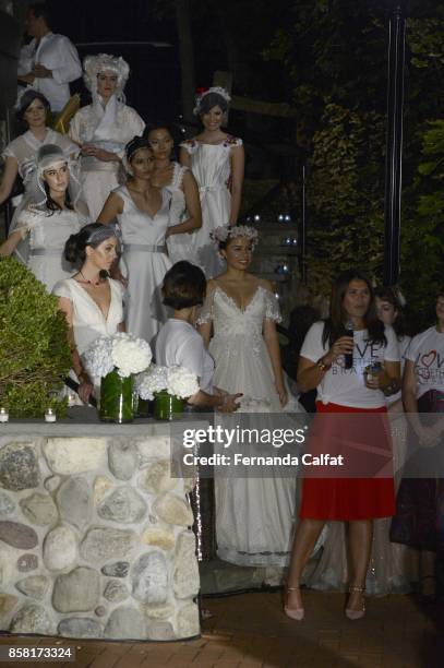 Models walk at Po de Arroz Runway at New York Fashion Week Bridal October 2017 at Hendrick's Tavern on October 5, 2017 in Roslyn, New York.