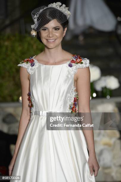 Model walks the Po de Arroz runway show at New York Fashion Week Bridal October 2017 at Hendrick's Tavern on October 5, 2017 in Roslyn, New York.