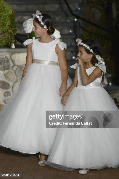 Sofia And Isabella Sarraf walk at Po de Arroz Runway at New York Fashion Week Bridal October 2017 at Hendrick's Tavern on October 5, 2017 in Roslyn,...