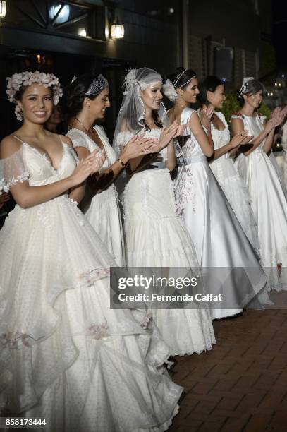 Models walk at Po de Arroz Runway at New York Fashion Week Bridal October 2017 at Hendrick's Tavern on October 5, 2017 in Roslyn, New York.