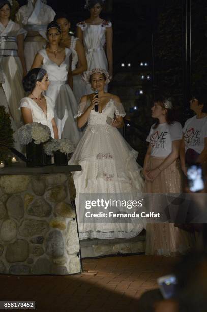 Models walk at Po de Arroz Runway at New York Fashion Week Bridal October 2017 at Hendrick's Tavern on October 5, 2017 in Roslyn, New York.