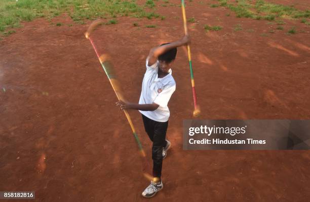 Prasad Chaudhari displays Double stick, a type of Silambam, a weapon based Indian Martial arts, on October 4, 2017 in Pune, India. The word Silambam...