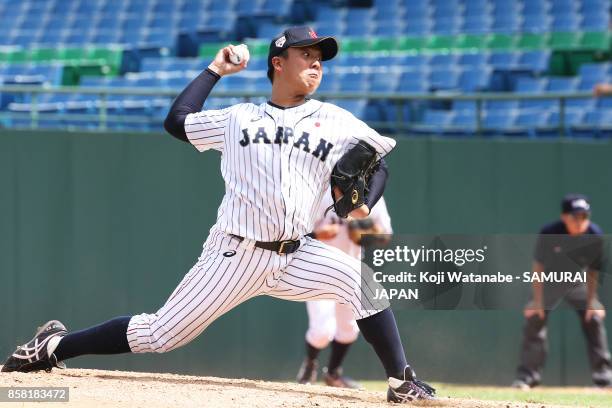 Starting pitcher Masaki Tanigawa of Japan throws in the top half of the second inning during the 28th Asian Baseball Championship Super Round match...