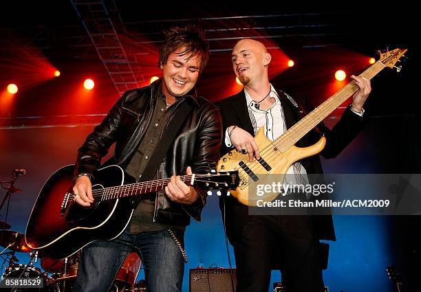 Frontman Mike Eli and bassist Jon Jones of the Eli Young Band performs during the 44th annual Academy of Country Music Awards All-Star Jam at the MGM...