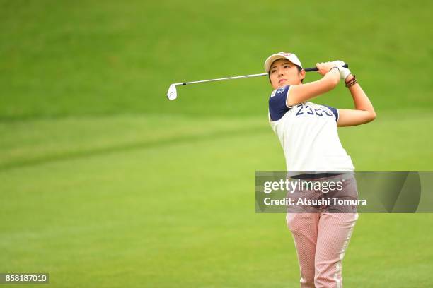 Rie Tsuji of Japan hits her second shot on the 8th hole during the first round of Stanley Ladies Golf Tournament at the Tomei Country Club on October...