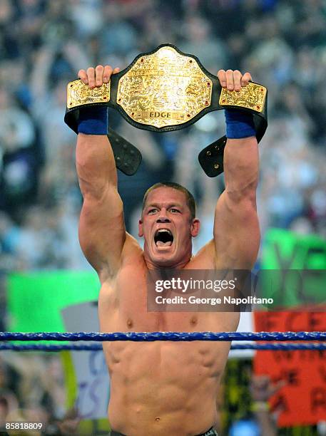 Actor, rapper and WWE superstar John Cena captures the World Heavyweight Championship at Wrestlemania 25 at Reliant Stadium on April 5, 2009.
