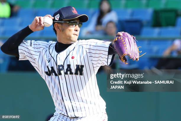 Pitcher Katsutoshi Satake of Japan throws a pitch in the top half of the ninerth inning during the 28th Asian Baseball Championship Super Round match...