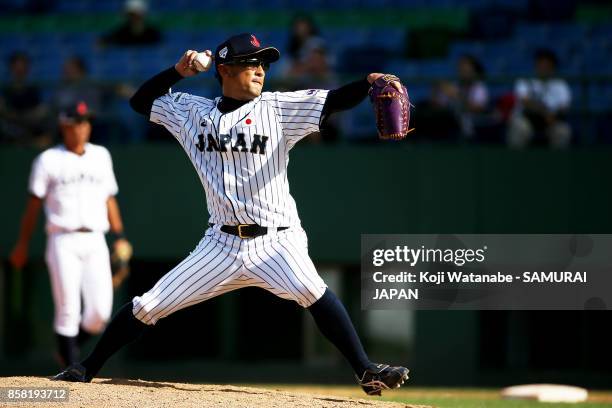 Pitcher Katsutoshi Satake of Japan throws a pitch in the top half of the ninerth inning during the 28th Asian Baseball Championship Super Round match...