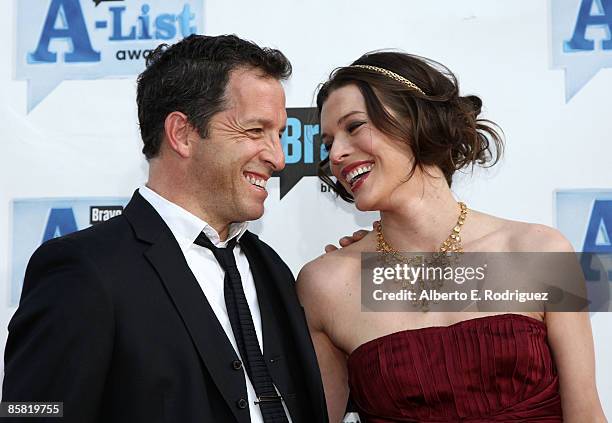 Designer Kenneth Cole and actress Milla Jovovich arrive at Bravo's 2nd annual A-List Awards held at the Orpheum Theater on April 5, 2009 in Los...