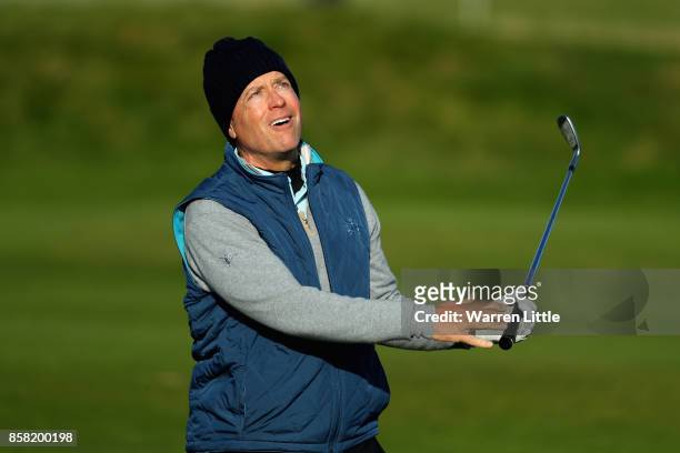 Actor, Greg Kinnear plays his second shot on the 5th during day two of the 2017 Alfred Dunhill Championship at Carnoustie on October 6, 2017 in St...