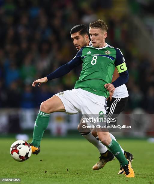 Steve Davis of Northern Ireland and Emre Can of Germany during the FIFA 2018 World Cup Qualifier between Northern Ireland and Germany at Windsor Park...