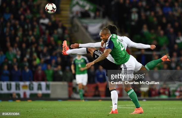 Josh Magennis of Northern Ireland and Mats Hummels of Germany during the FIFA 2018 World Cup Qualifier between Northern Ireland and Germany at...