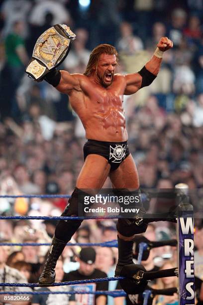 Triple H retains the WWE Championship belt after defeating Randy Orton at "WrestleMania 25" at the Reliant Stadium on April 5, 2009 in Houston, Texas.