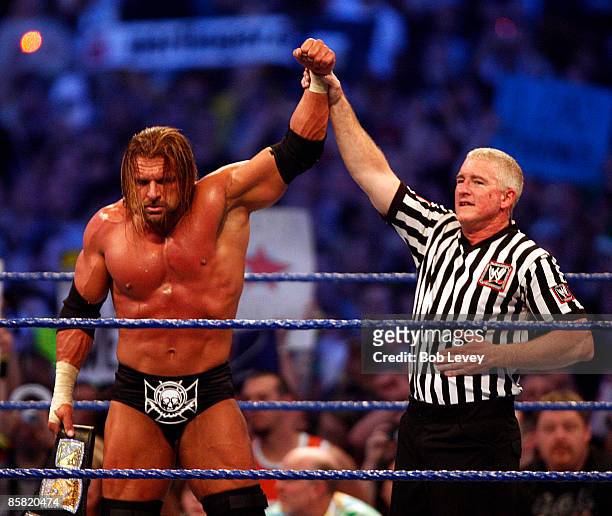 Triple H retains the WWE Championship belt after defeating Randy Orton at "WrestleMania 25" at the Reliant Stadium on April 5, 2009 in Houston, Texas.