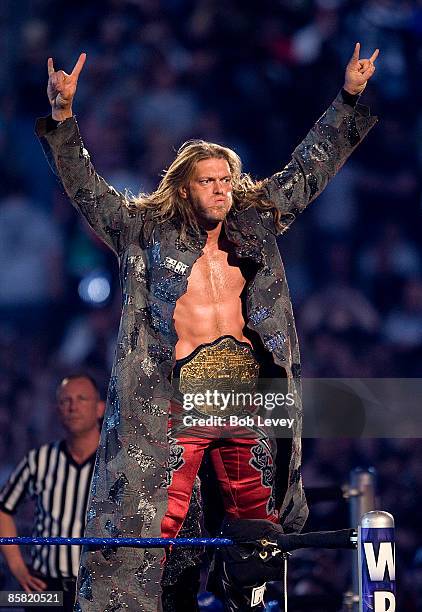 World Heavyweight champion Edge works the crows before his triple threat match with John Cena and Big Show at "WrestleMania 25" at the Reliant...