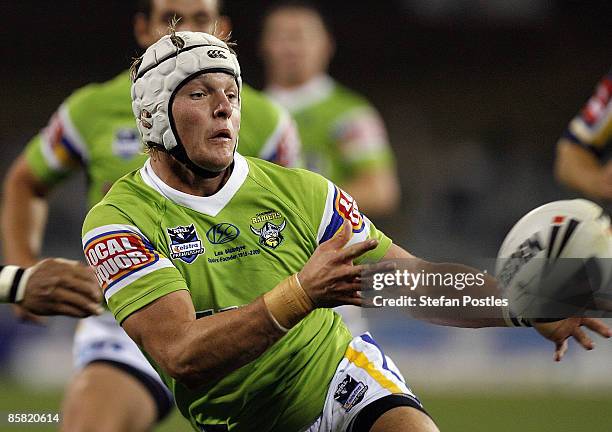 Jarrod Croker of the Raiders passes the ball during the round four NRL match between the Canberra Raiders and the North Queensland Cowboys at...