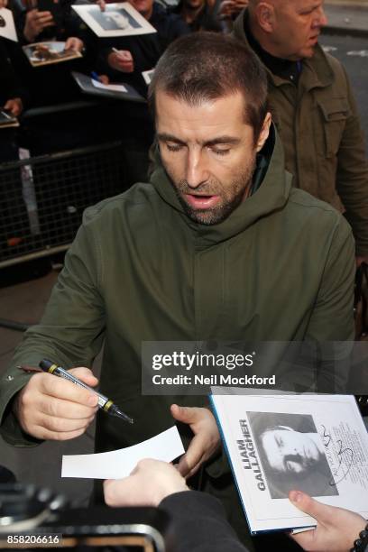 Liam Gallagher signing autographs at BBC Radio 2 on October 6, 2017 in London, England.