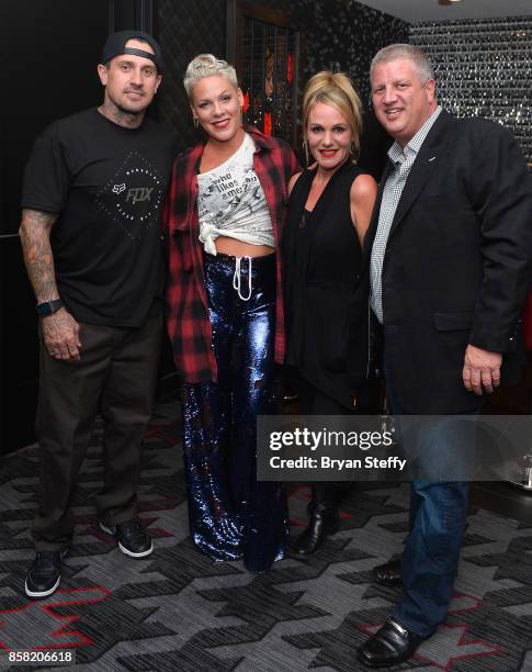 Freestyle motocross rider Carey Hart, recording artist Pink, Nicole Parthum and The D Las Vegas owner Derek Stevens attend a surprise event in...