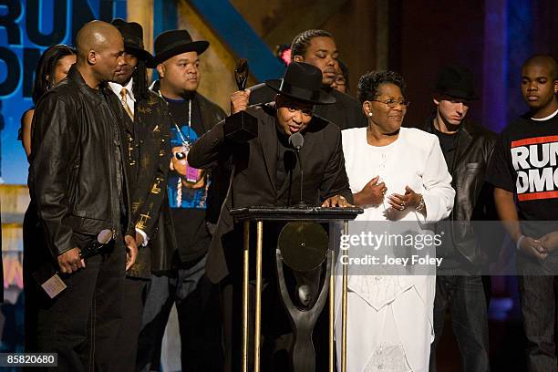 Rapper Joseph 'Reverend Run' Simmons speaks onstage as Run D.M.C. Is inducted during the 24th Annual Rock and Roll Hall of Fame Induction Ceremony at...