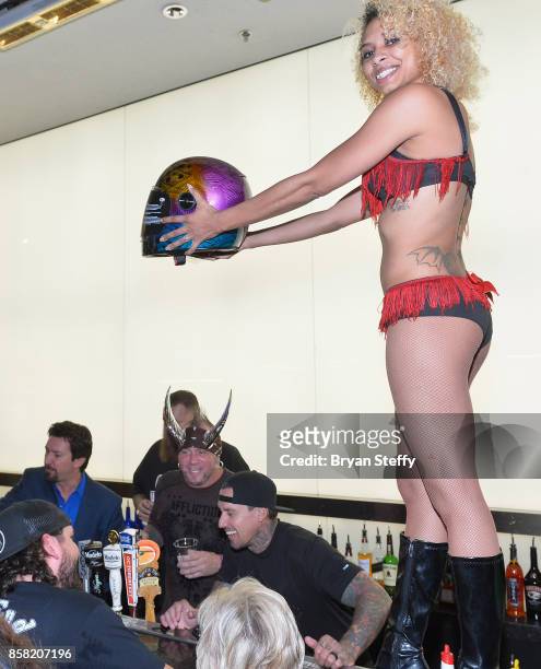 Rapper Bryan 'Big B' Mahoney, television personality 'Horny' Mike Henry and freestyle motocross rider Carey Hart surprise guests as bartenders in...