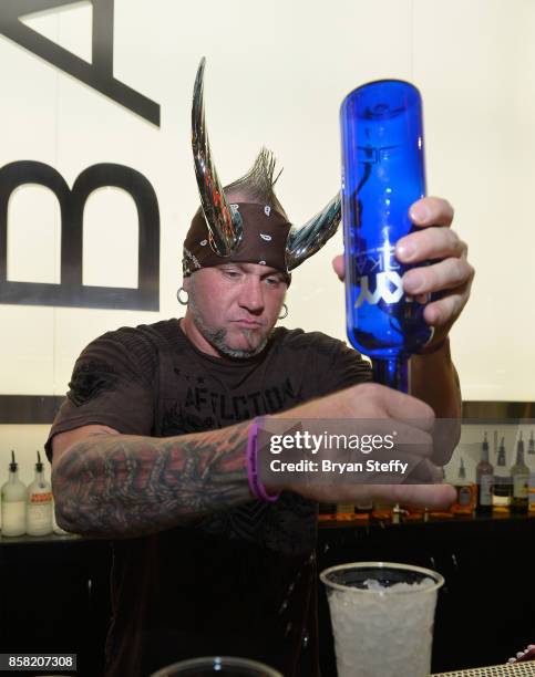 Television personality 'Horny' Mike Henry surprises guests as a bartender in support of Carey Hart's Good Ride Rally benefiting Infinite Hero...