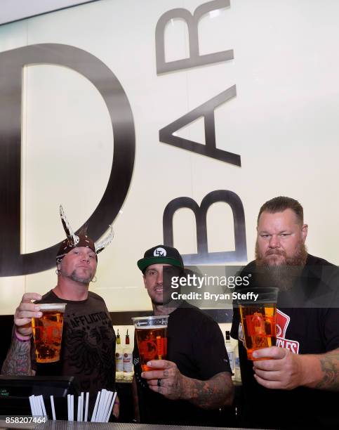 Television personality 'Horny' Mike Henry, freestyle motocross rider Carey Hart and rapper Bryan 'Big B' Mahoney surprise guests as bartenders in...