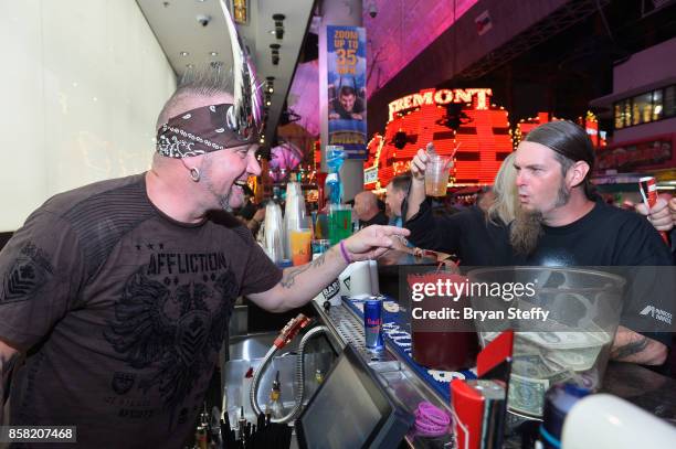 Television personality 'Horny' Mike Henry surprises guests as a bartender in support of Carey Hart's Good Ride Rally benefiting Infinite Hero...