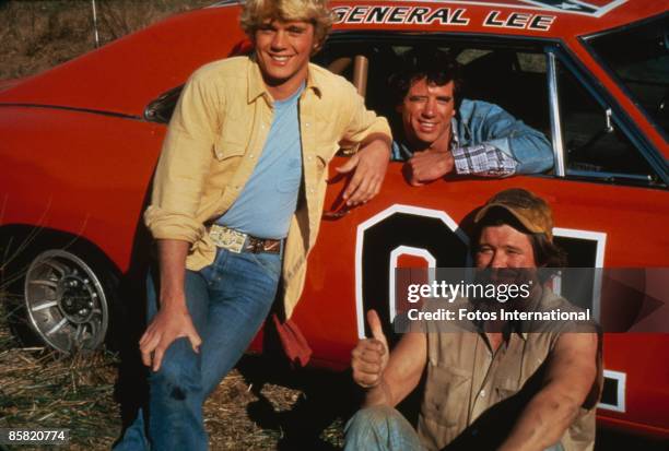 American actors John Schneider, Tom Wopat and Ben Jones as Bo Duke, Luke Duke and Cooter, respectively, in the TV series 'The Dukes of Hazzard',...