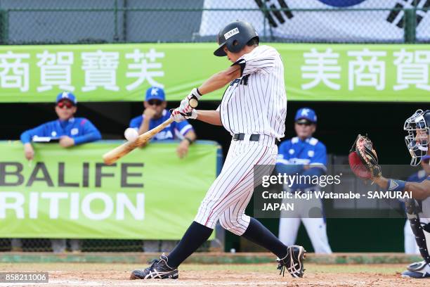 Shoji Kitamura of Japan bats in the bottom half of the third inning during the 28th Asian Baseball Championship Super Round match between Japan and...