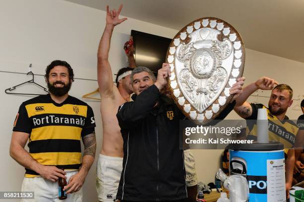 Head Coach Colin Cooper of Taranaki lifts the Ranfurly Shield after the win in the round eight Mitre 10 Cup match between Canterbury and Taranaki at...