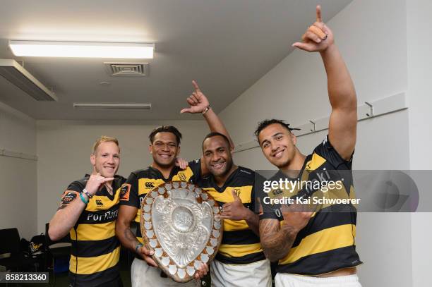 Marty McKenzie, Seta Tamanivalu, Manasa Mataele and Sean Wainui of Taranaki pose with the Ranfurly Shield after the win in the round eight Mitre 10...