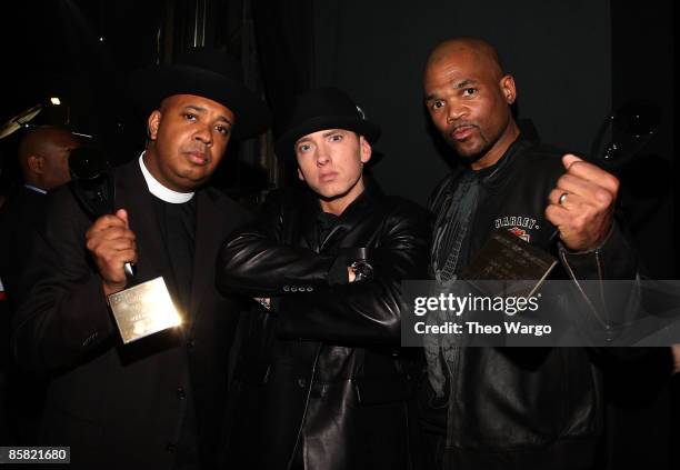 Rapper Eminem with Joseph "Rev. Run" Simmons and Darryl "D.M.C." McDaniels attend the 24th Annual Rock and Roll Hall of Fame Induction Ceremony at...