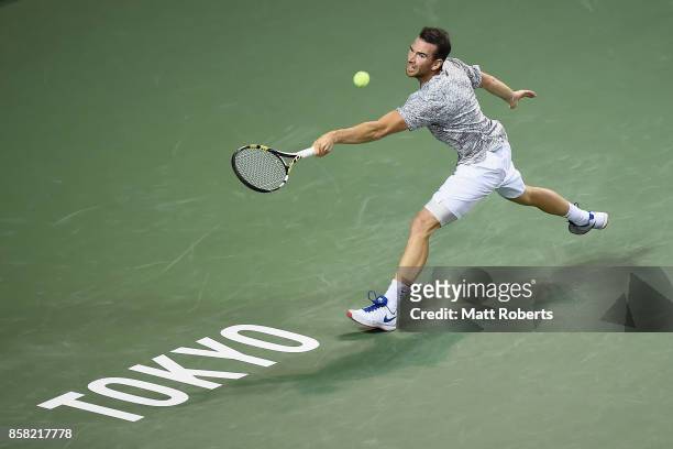 Adrian Mannarino of France plays a backhand in his quarterfinal match against Yuichi Sugita of Japan during day five of the Rakuten Open at Ariake...