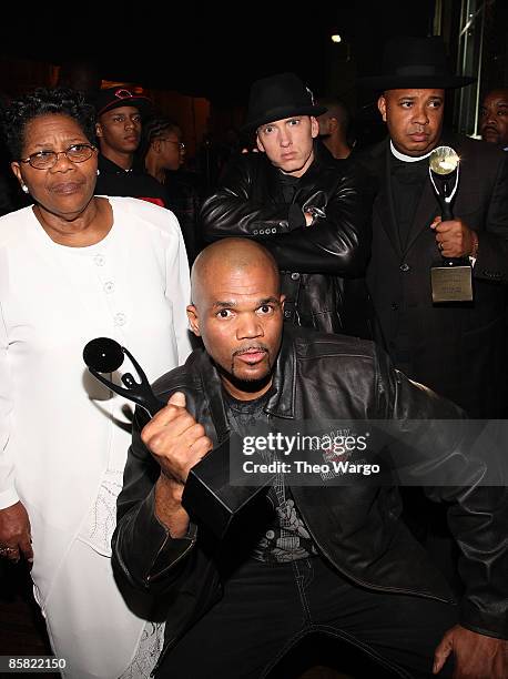 Connie Perry, mother of deceased Jason "Jam Master Jay" Mizell, Darryl "D.M.C." McDaniels, Eminem and Joseph "Rev. Run" Simmons attend the 24th...