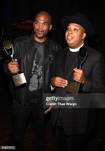 Darryl "D.M.C." McDaniels and Joseph "Rev. Run" Simmons of Run- D.M.C. Pose in the press room during the 24th Annual Rock and Roll Hall of Fame...