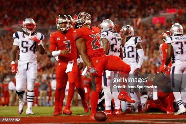 Tampa Bay Buccaneers running back Doug Martin celebrates after scoring a touchdown in the 2nd quarter of the NFL game between the New England...