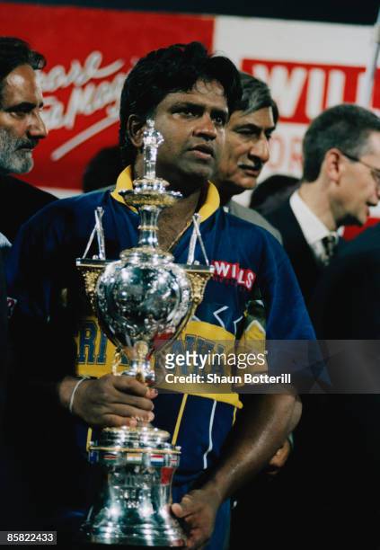 Sri Lankan captain Arjuna Ranatunga with the trophy after his team beat Australia by seven wickets in the final of the Cricket World Cup at the...