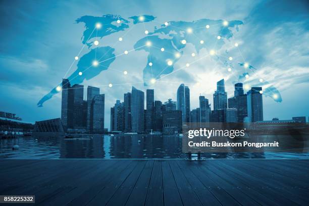 international business concept background with network on map and sunlight - singapore sky view stock pictures, royalty-free photos & images