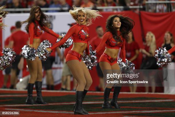 Tampa Bay Buccaneers cheerleader in action during the NFL game between the New England Patriots and Tampa Bay Buccaneers on October 5 at Raymond...