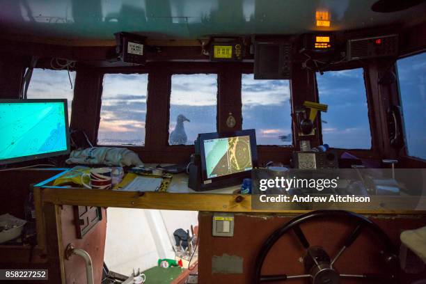 The sonar and other marine equipment in the boats cabin used to avoid major objects on the sea bed while his nets are down trawling for fish. Luke is...