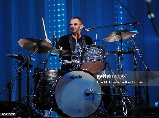 Musician Ringo Starr performs onstage at the David Lynch Foundation "Change Begins Within" show at Radio City Music Hall on April 4, 2009 in New York...