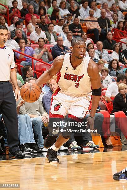 Dwyane Wade of the Miami Heat drives the ball to the basket during the game against the Orlando Magic on March 30, 2009 at American Airlines Arena in...