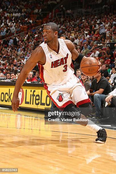 Dwyane Wade of the Miami Heat drives the ball to the basket during the game against the Orlando Magic on March 30, 2009 at American Airlines Arena in...