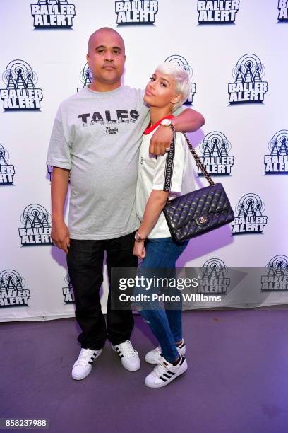 Irv Gotti and Ashley Martelle attend Baller Alert's Bowl With a Baller at Basement Bowl on October 5, 2017 in Miami, Florida.