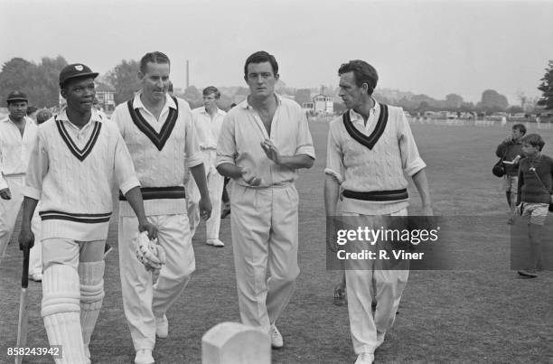 Australian first class cricketer Ken Grieves leaving the field with his teammates of Lancashire County Cricket Club, after losing a game against...